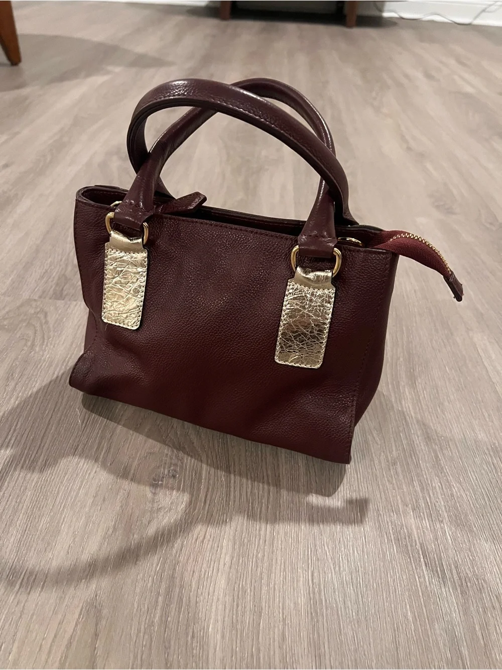 Classic Burgundy Pebbled Leather Satchel with Gold Accents